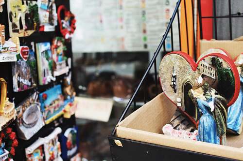 province of verona couple kissing figurine on top of rack near display of product packs italy